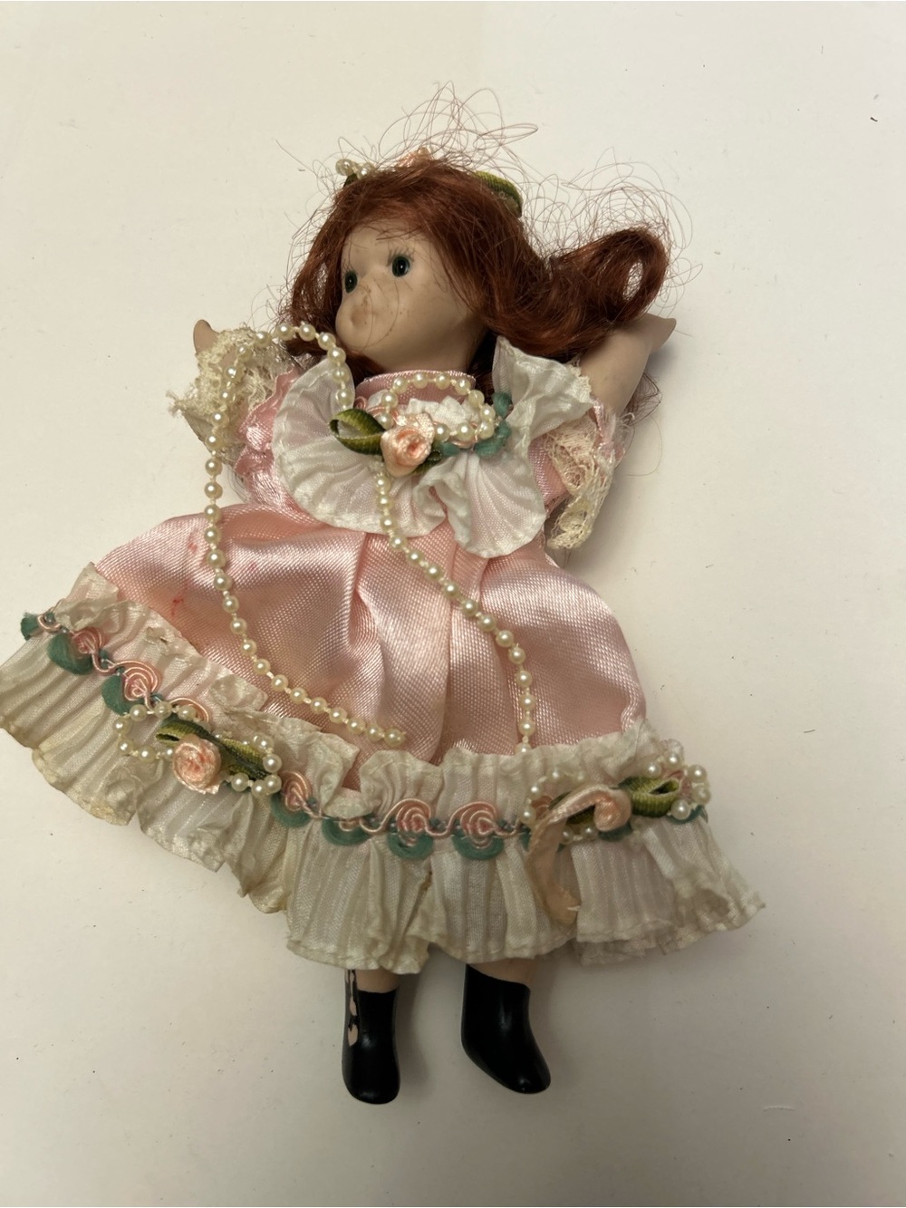 Source Unknown Pink Satin Porcelain Doll with Floral Trim